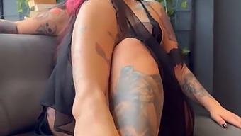 Aroused Young Woman With Tattoos Flaunts Her Physique