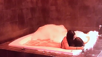 Passionate Couple Enjoys Intimate Moments In The Jacuzzi