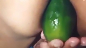 Stepmom Shows Off Her Open Ass While Using A Large Cucumber